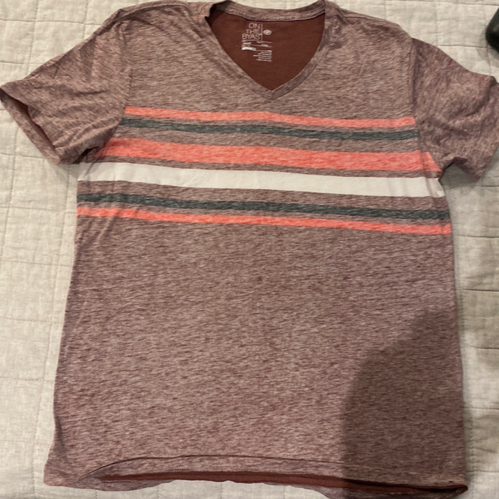 On the Byas tee shirt size medium